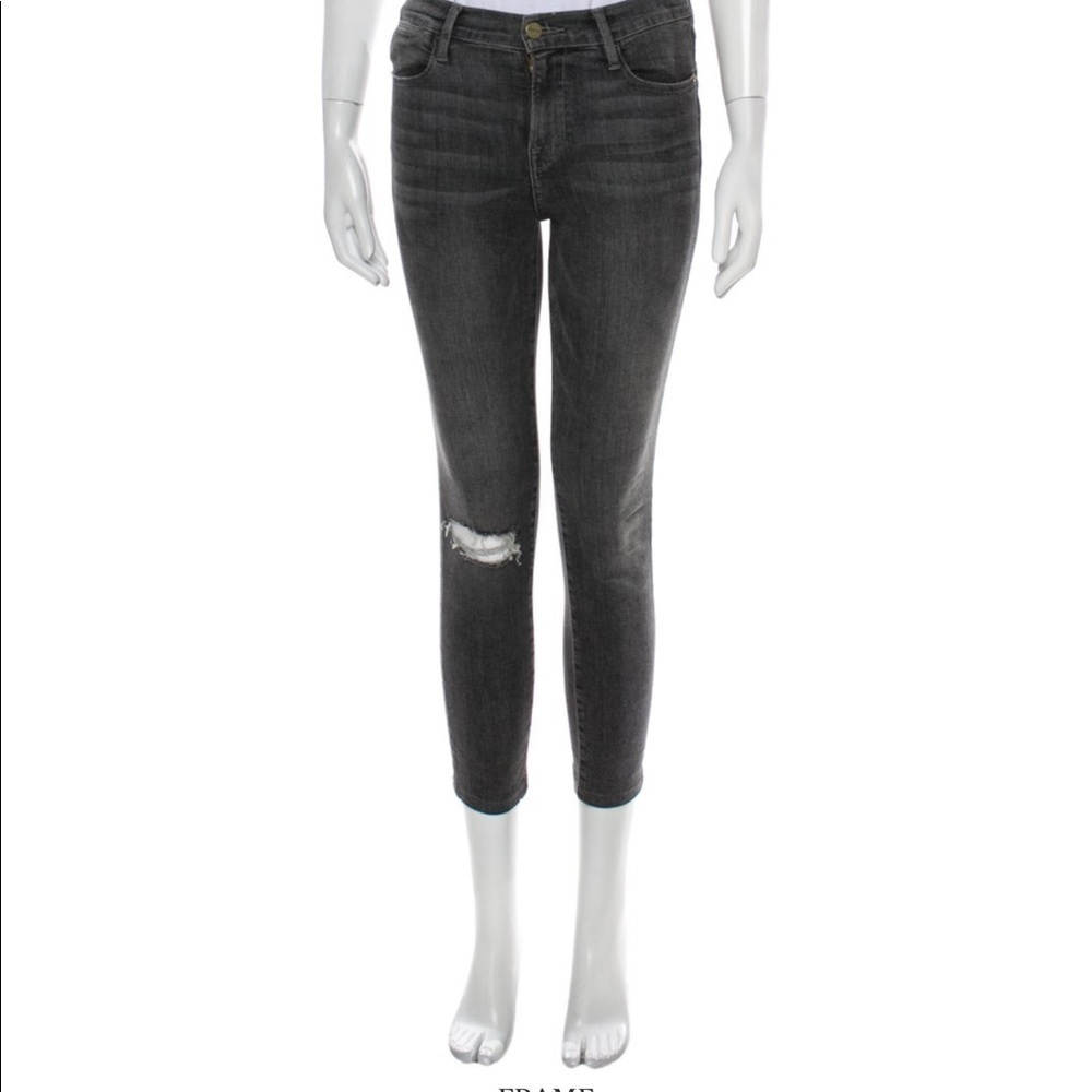 Frame dark wash skinny leg jeans pants. Distressed at the knee. Size 25